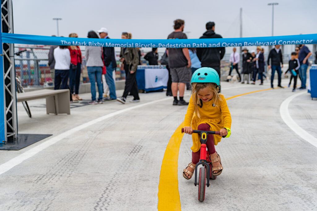 The opening for the Mark Bixby Memorial Bicycle-Pedestrian Path was held Sunday, May 20, 2023. The event continued with a ribbon cutting on the path, followed by cyclists and pedestrians using the path for the first time.