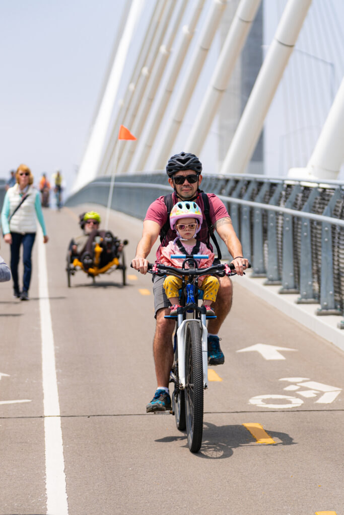 The opening for the Mark Bixby Memorial Bicycle-Pedestrian Path was held Sunday, May 20, 2023. The event continued with a ribbon cutting on the path, followed by cyclists and pedestrians using the path for the first time.