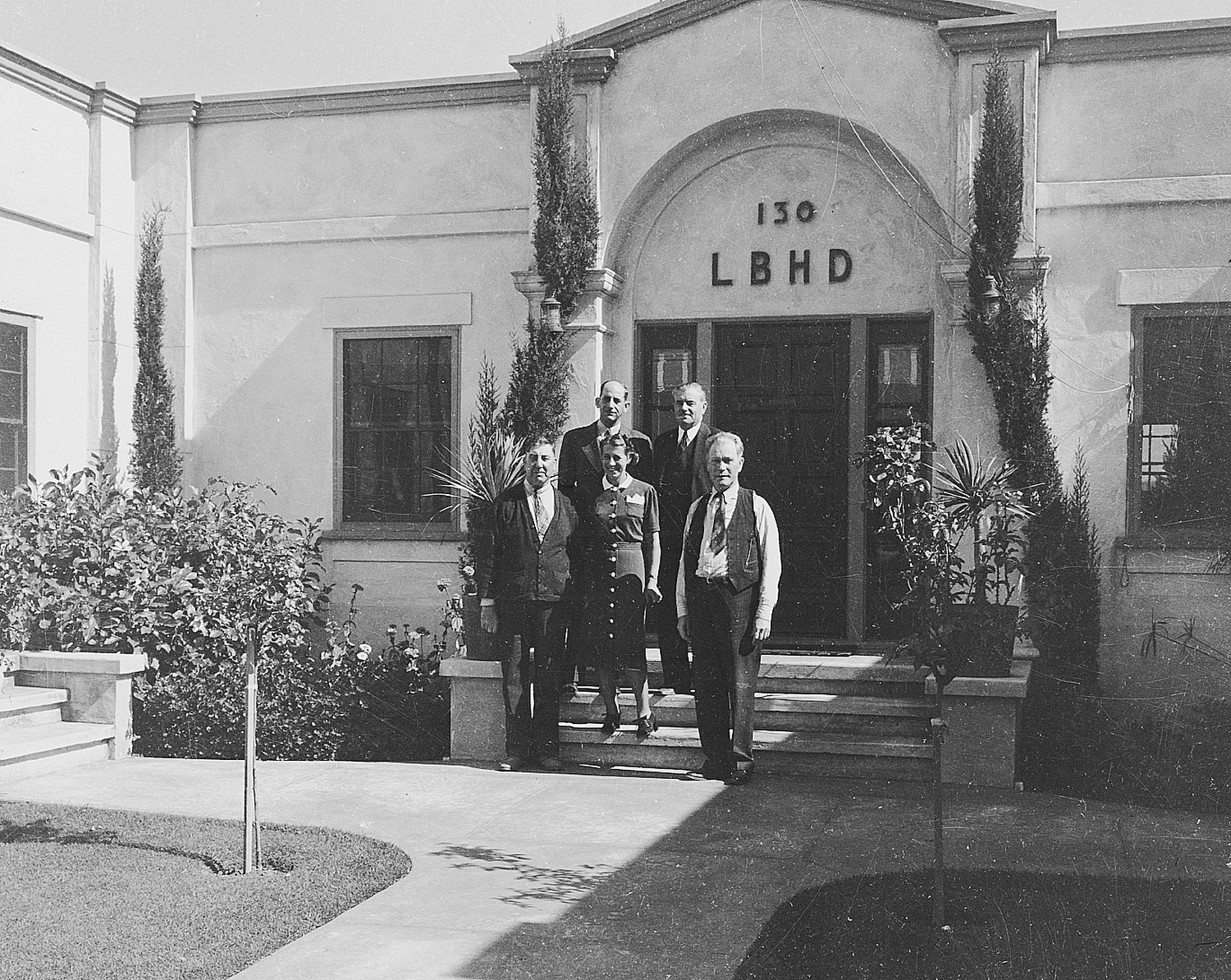 Harbor Department staff pose for a photo outside Port HQ in 1938.
