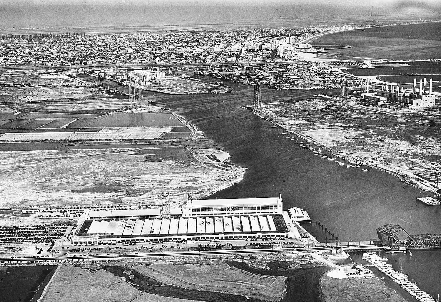 The Ford plant, foreground, opened in 1930, turning out vehicles until 1957. It was torn down in 1990.