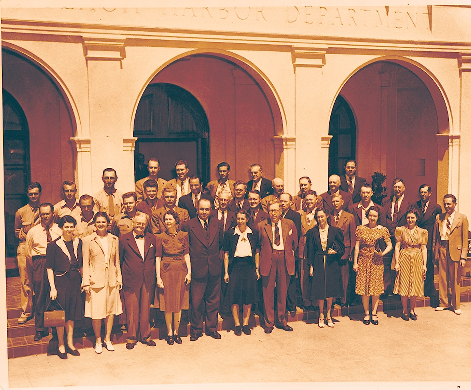Harbor Department staff gather for a group shot around 1940. Eloi ÒFrenchyÓ Amar, Port general manager at the time, is the tall man with his jacket buttoned near the center of the front row.