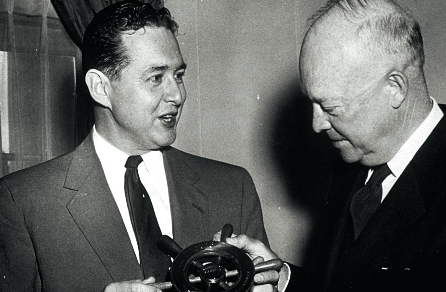 President Dwight Eisenhower receives the PortÕs first Honorary Port Pilot Award from Congressman Craig Hosmer in 1954.