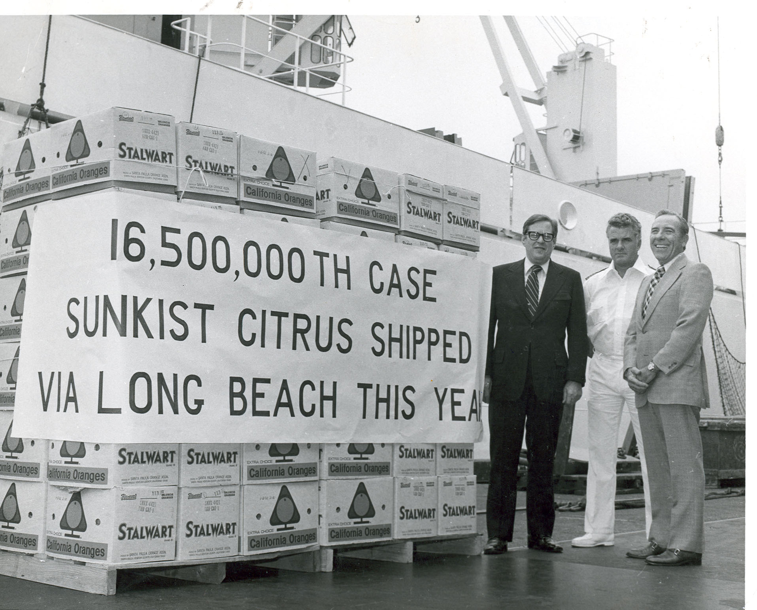 A citrus milestone is celebrated in 1975. At right is H.E. ÒBudÓ Ridings, who served on the Harbor Commission for a record 24 years.